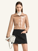 COURRÈGES REEDITION VINYL JACKET BRONZER