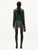 COURRÈGES REEDITION VINYL SKIRT VERT FONCE